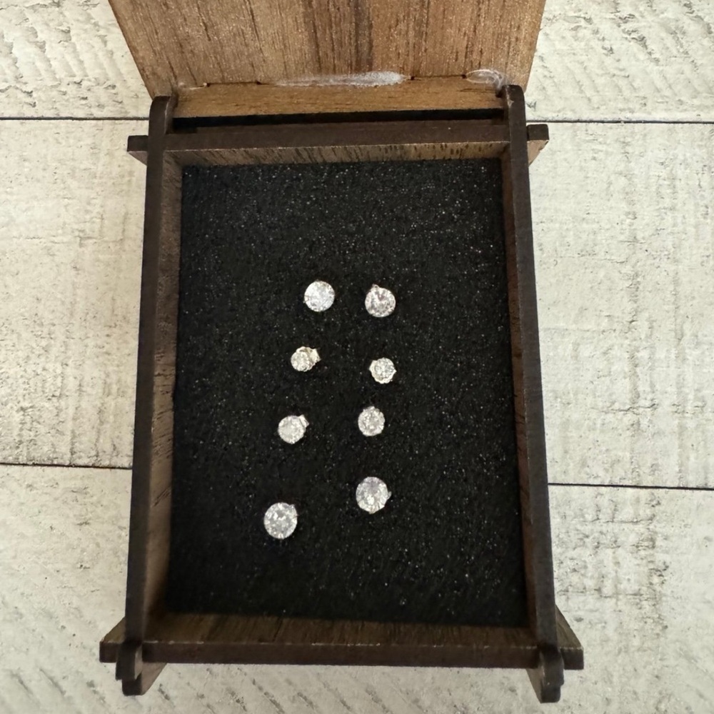 4 PAIRS OF SILVER STUD EARRINGS